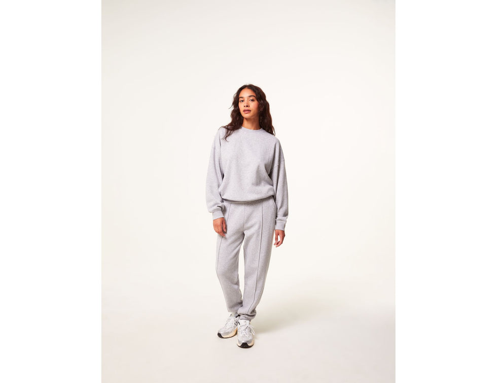Jogging gris coutures apparentes