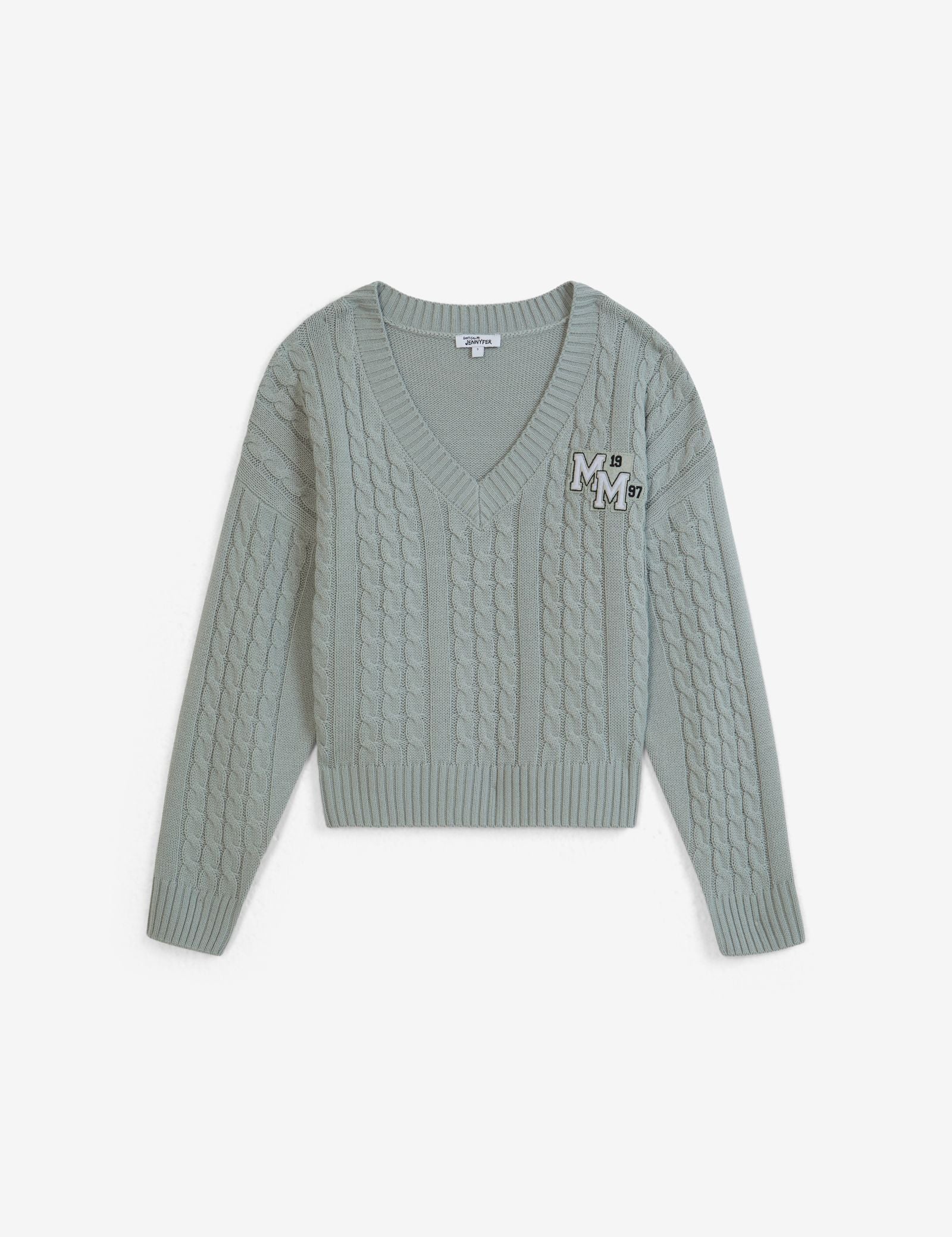 Pull en maille tressée avec message brodé vert clair