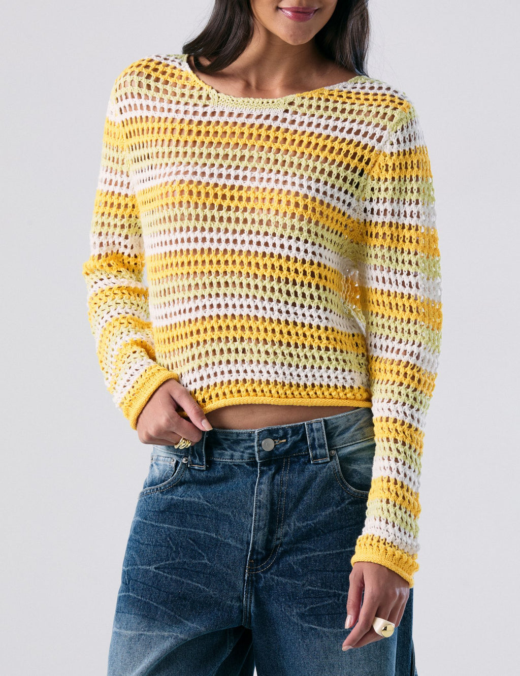 Pull en crochet orange jaune blanc