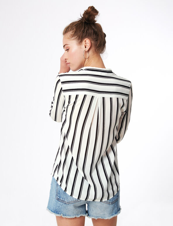 White and black striped shirt girl