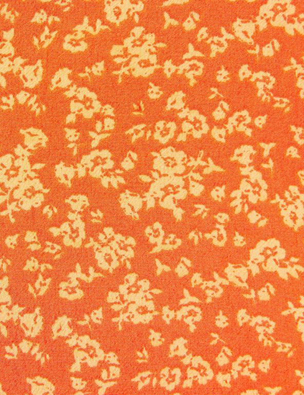 Jupe short à motifs fleuris orange