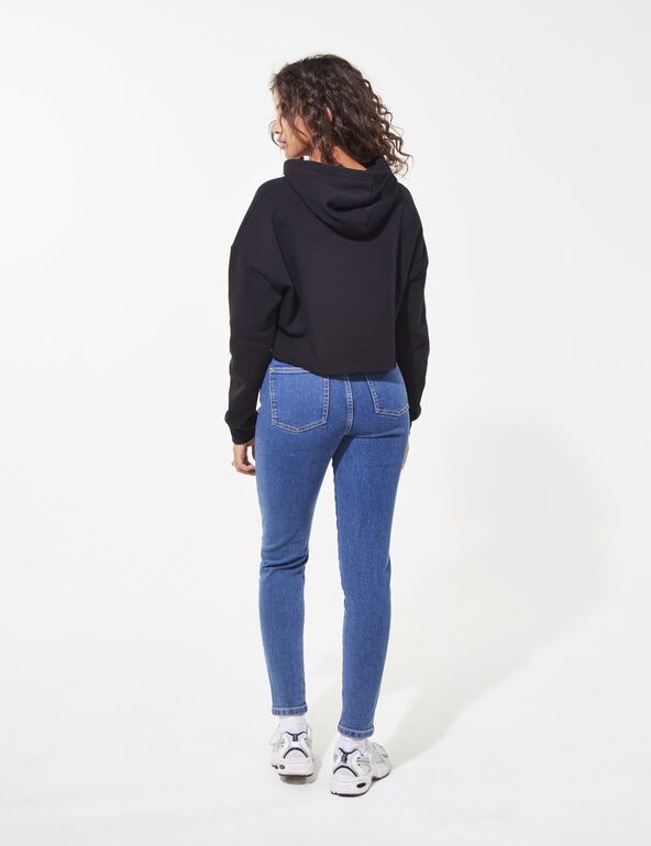 High-waisted skinny jeans girl