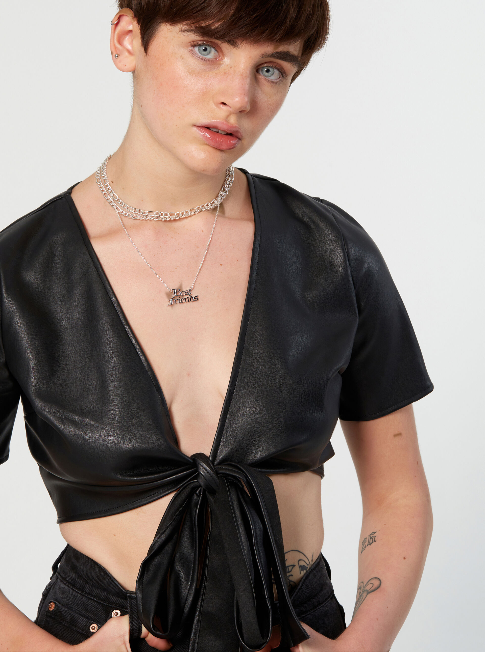 Faux leather wrap top