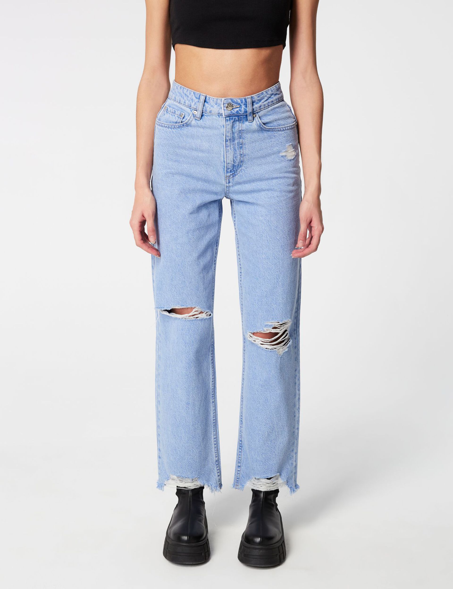 High-waisted distressed jeans