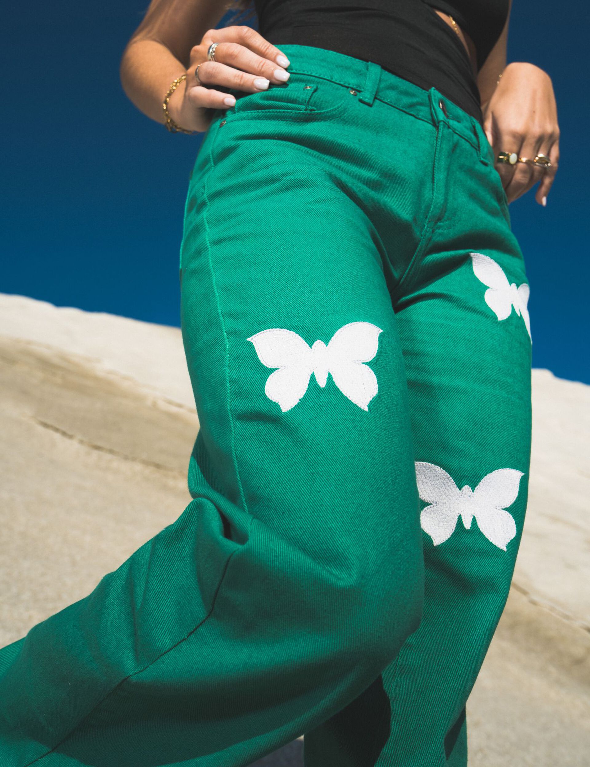 Green Envy butterfly jeans