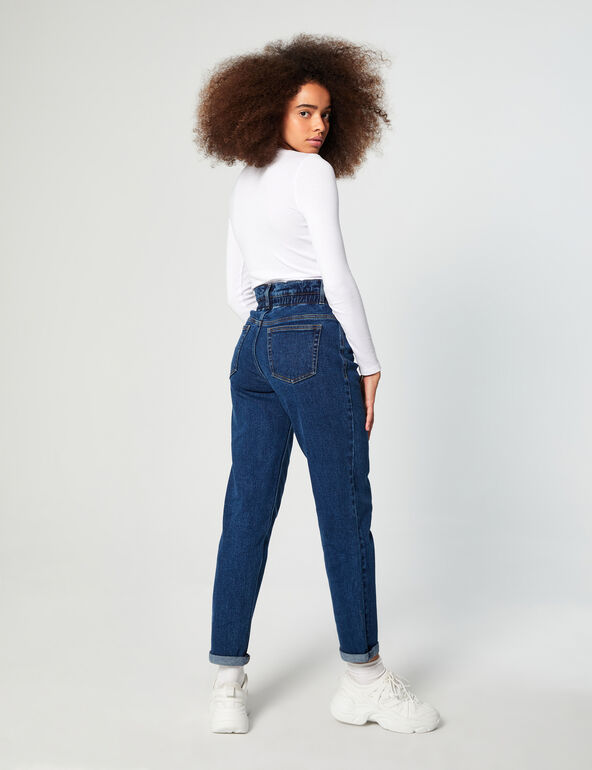 High-waisted paperbag jeans girl