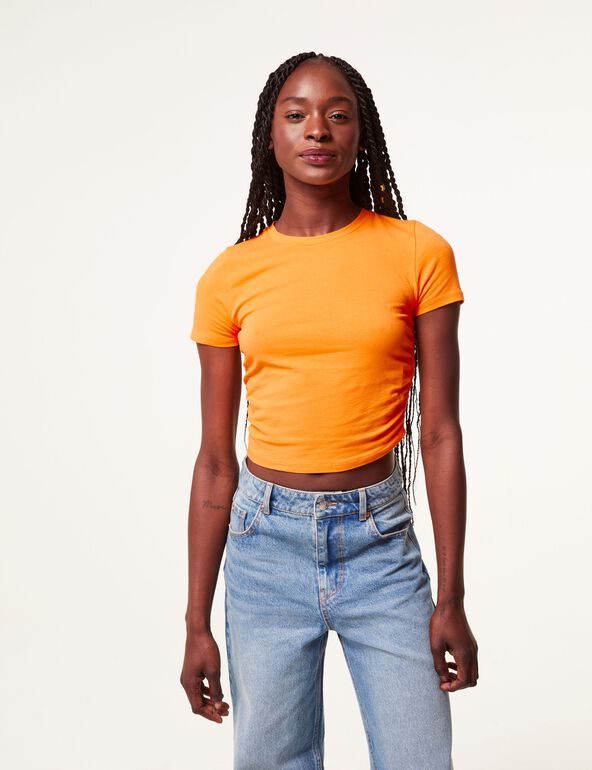 Top tee-shirt orange fronces sur les côtés teen
