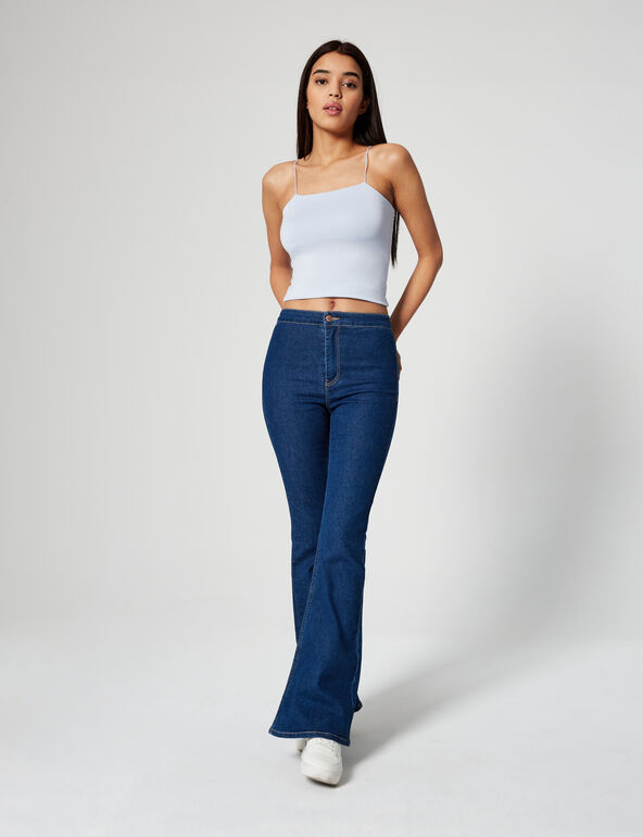 High-waisted flared jeans woman