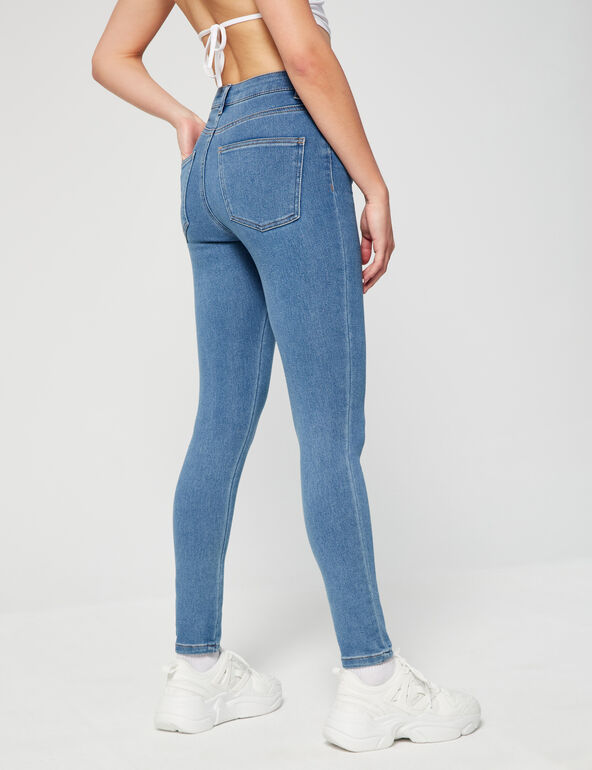 High-waisted jeggings woman