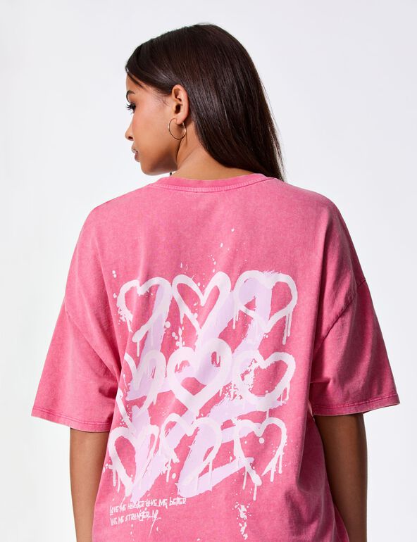 T-shirt oversize délavé à message rose ado