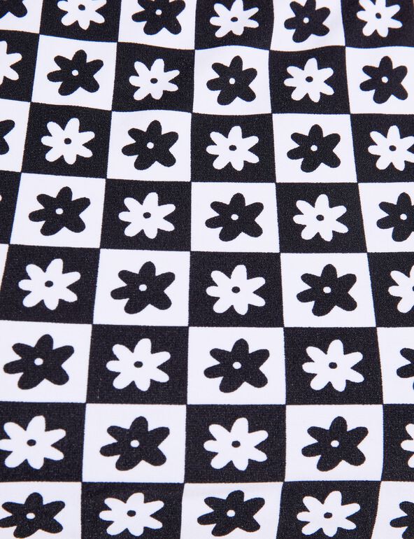 Haut de maillot de bain motif damier fleuri noir et blanc