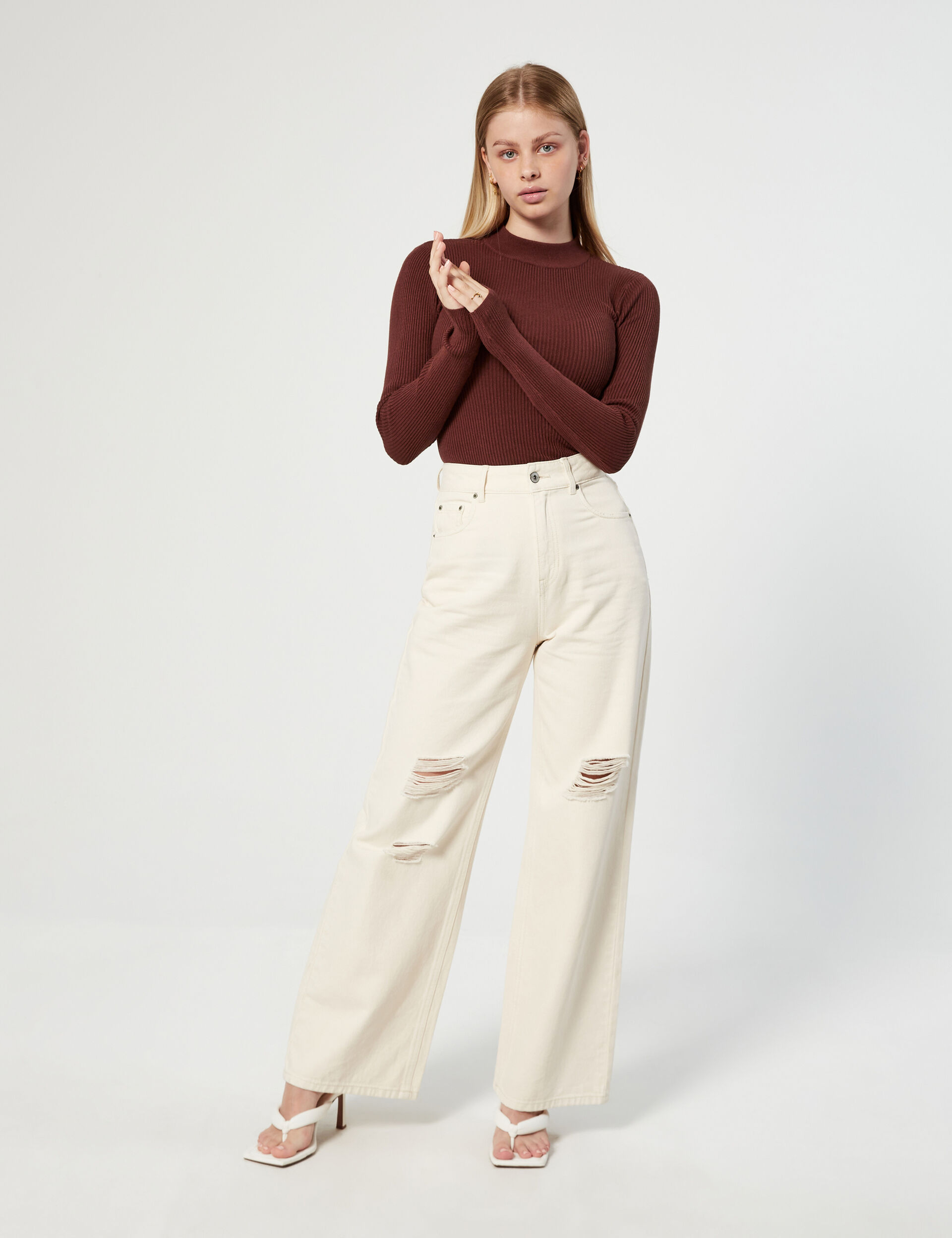 High-necked ribbed jumper