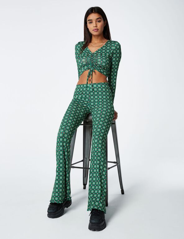 Seventies flared trousers girl